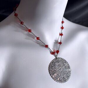 Bohemian stamped filigree metal pendant necklace with red glass beads